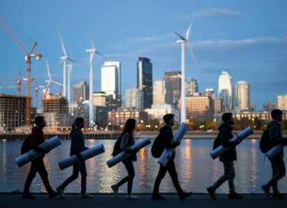 At dusk, a Canadian city skyline over a river shows wind turbines and cranes in the background while youth advocates approach the waterfront in the foreground.